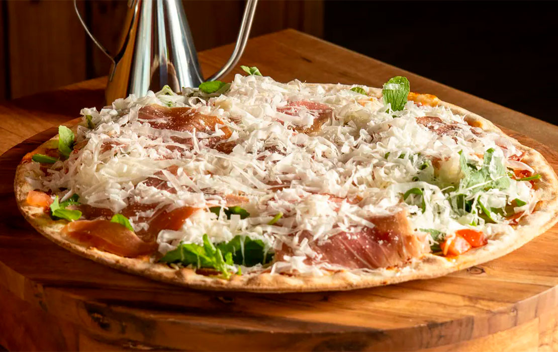 Ryge Pizza – Justo - Portada del beneficio exclusivo Banco Chile